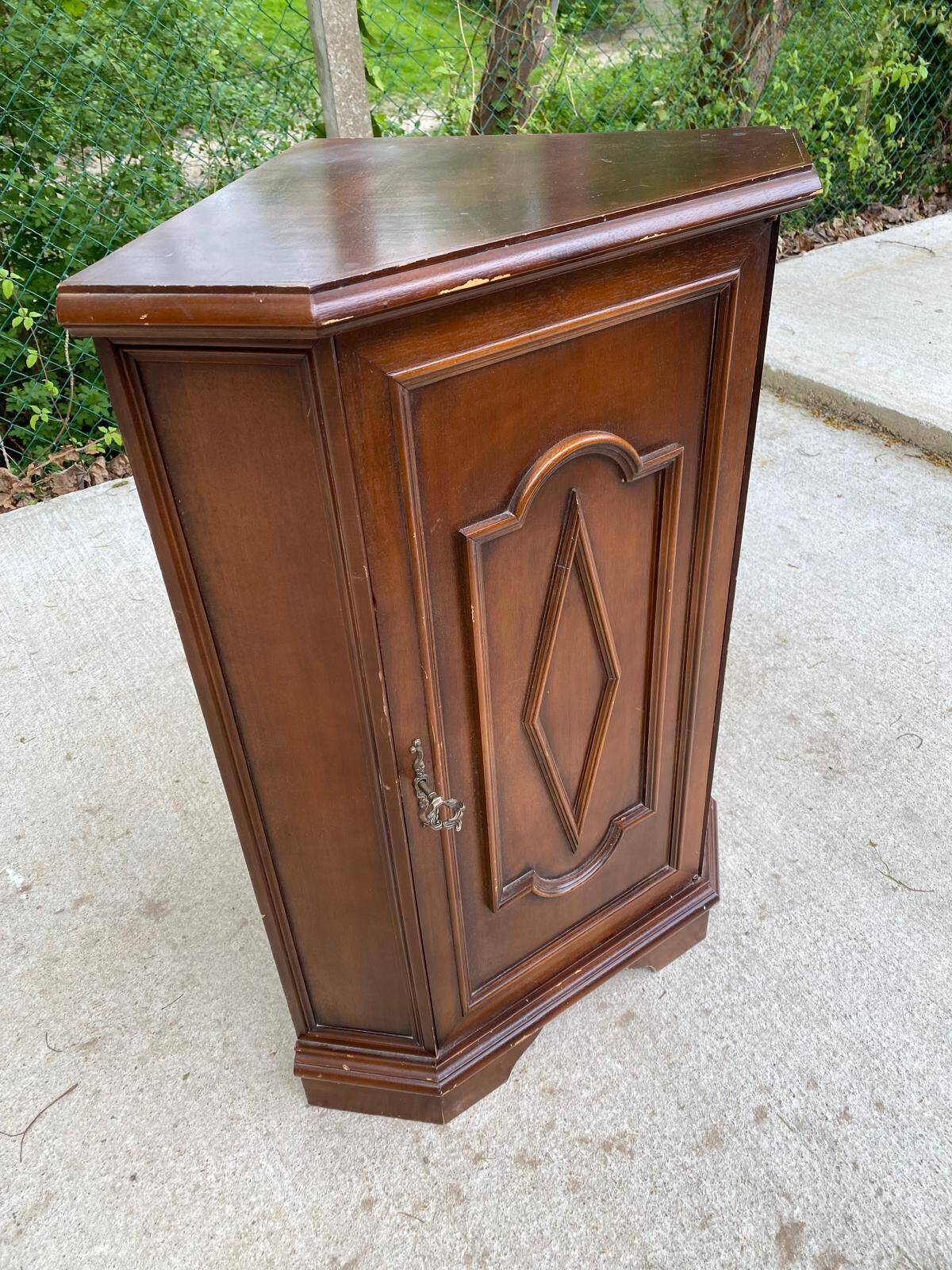 Colonial-style wooden corner entryway chest