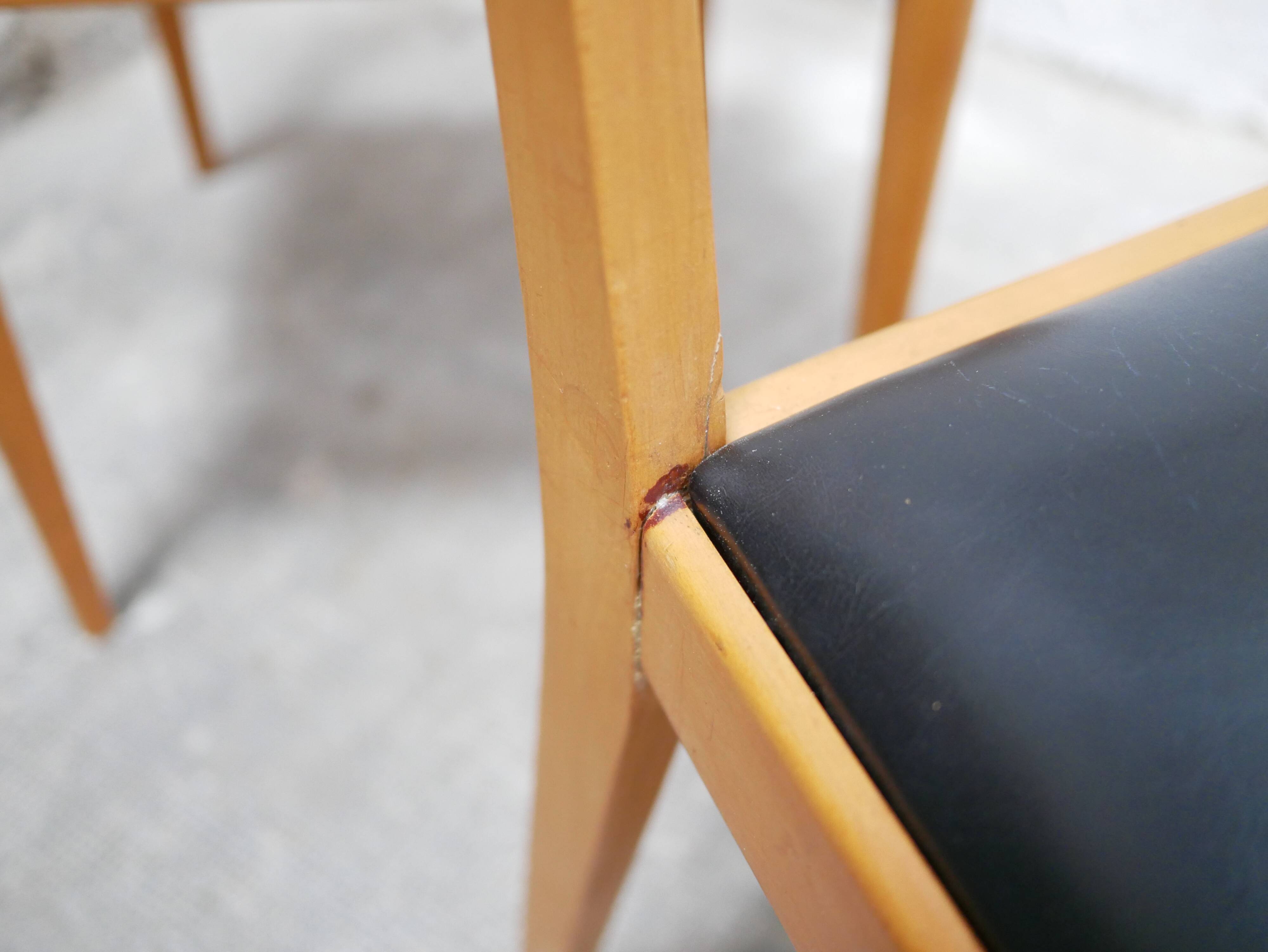 Series of 4 vintage chairs in wood and skaï