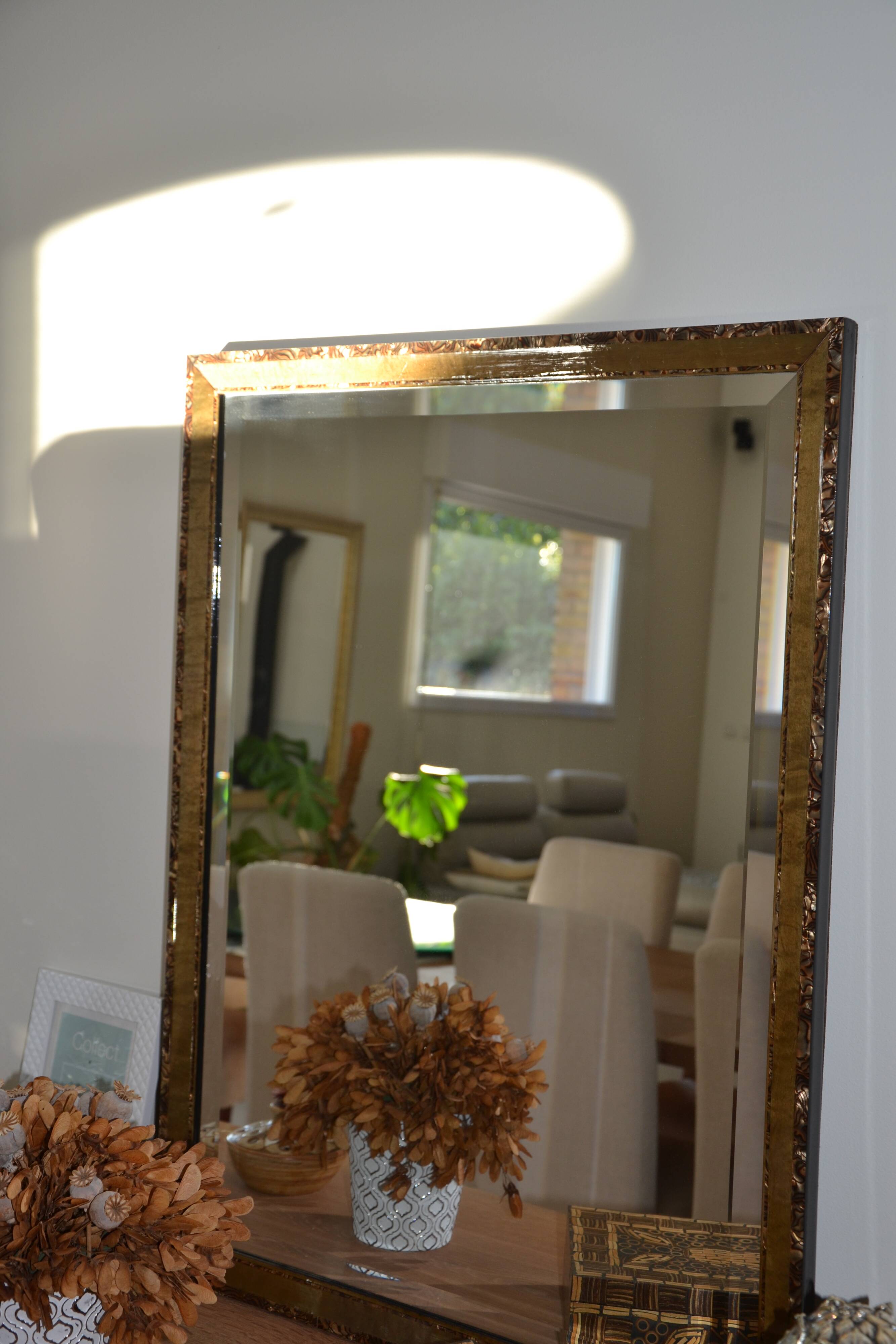 Large bevelled khaki mirror in mother-of-pearl from the 70s/80s.