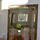 Large bevelled khaki mirror in mother-of-pearl from the 70s/80s.