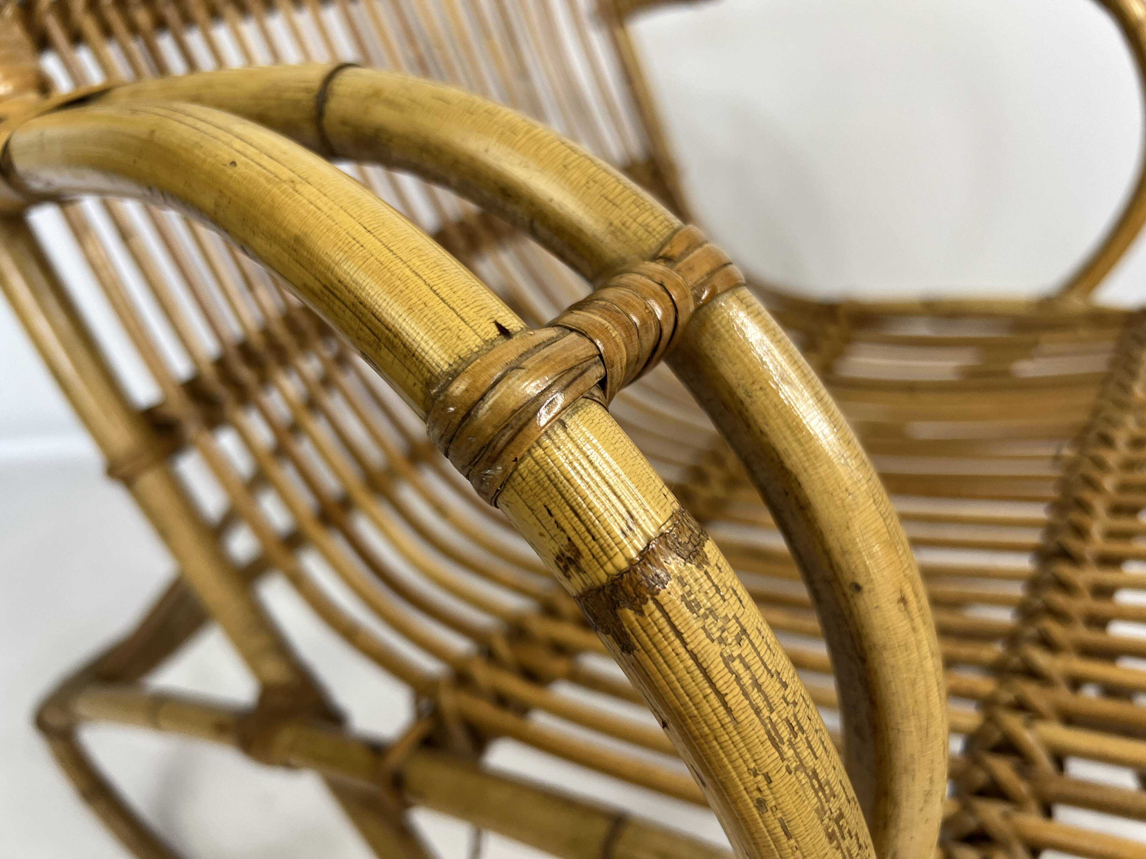 Vintage rattan armchair from the 1960s-1970s.