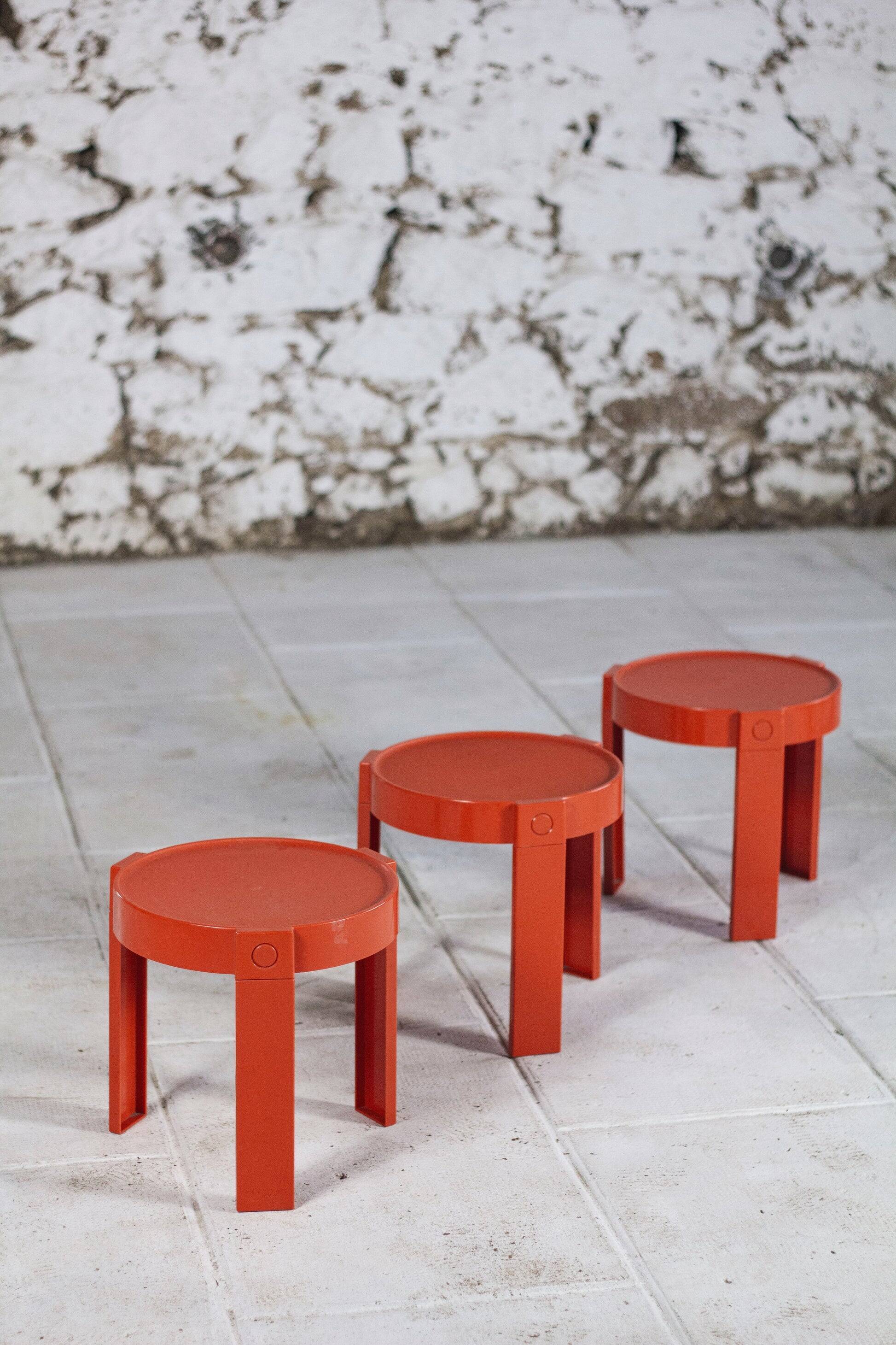 3 nesting tables in orange plastic by Prisunic, 1970.