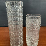 A pair of vintage rolled glass vases.