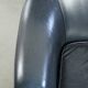 Dark blue cowhide club armchair with a unique and timeless design