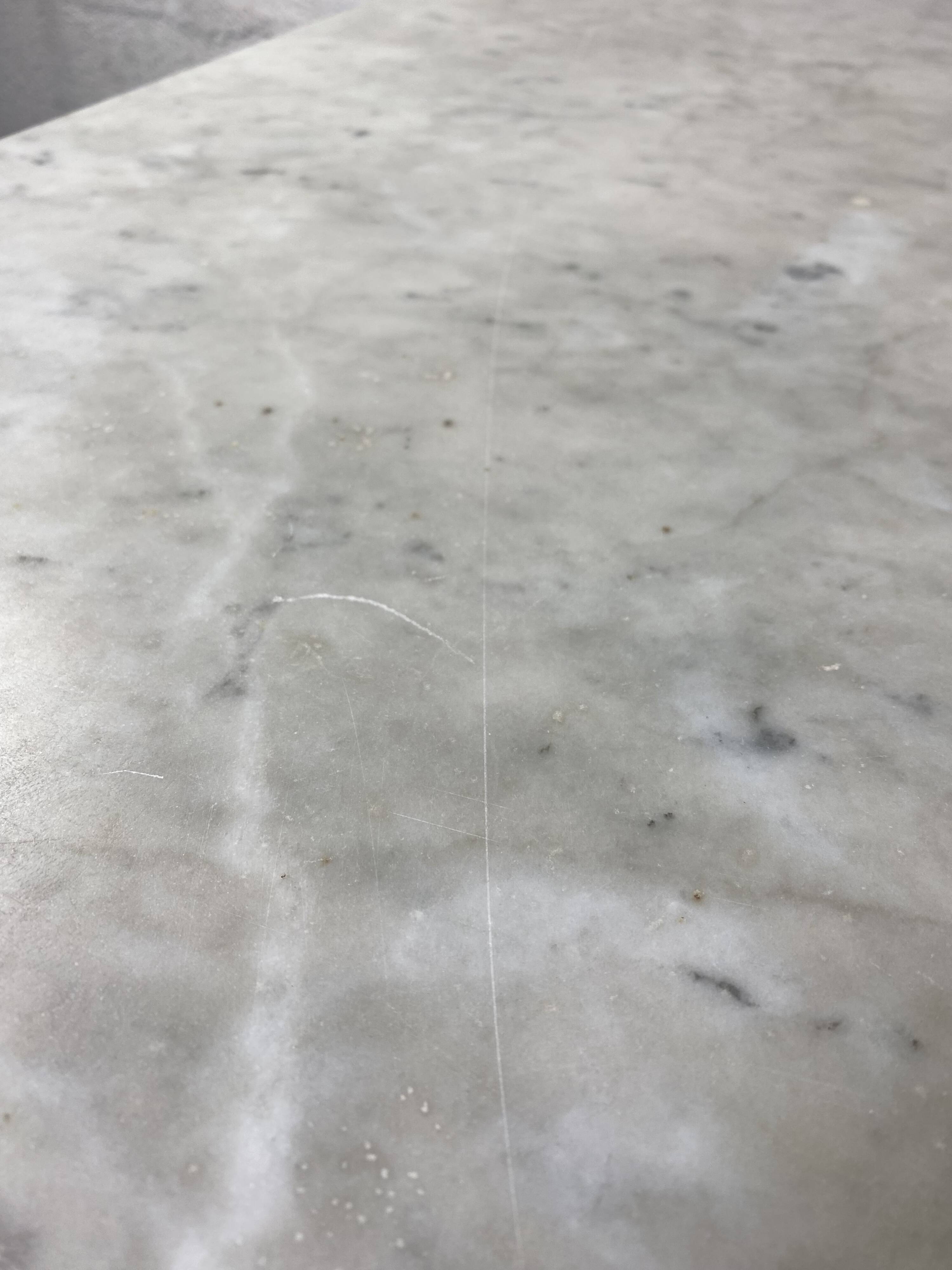 Set of two bistro tables in marble and wrought iron