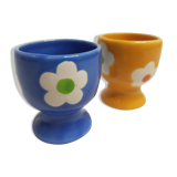 Pair of blue and yellow cockroaches with floral motifs