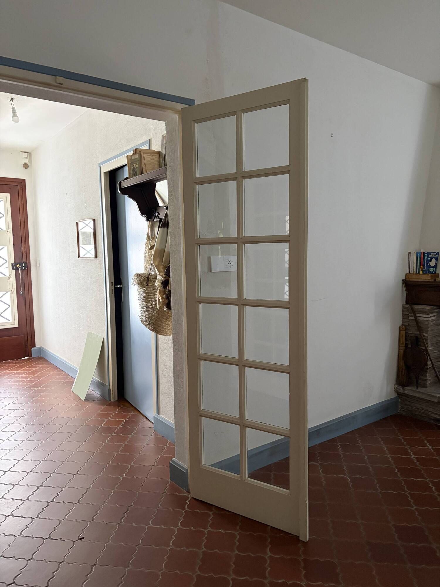Triptych glass door with three panels featuring small panes. Vintage.