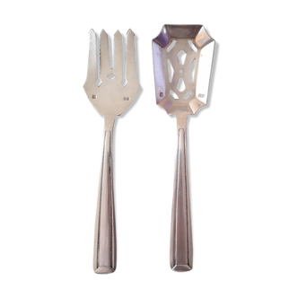 Pair of silver metal cutlery in the early 20th century