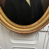 Oil on canvas portrait of a man, late 19th century, oval frame gilded with gold leaf.