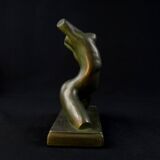 Modern sculpture of a nude woman in green ceramic, signed Carlos Nazareth
