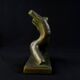 Modern sculpture of a nude woman in green ceramic, signed Carlos Nazareth