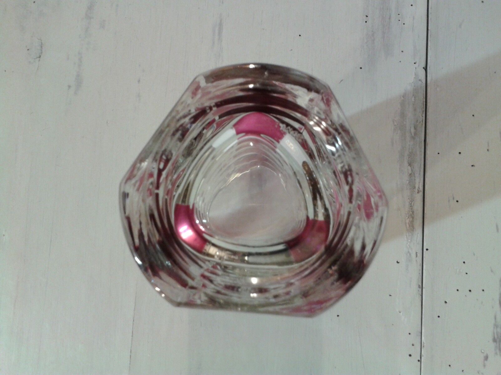 Thick red faceted glass vase