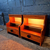 Pair of rosewood bedside tables, 1960s-70s