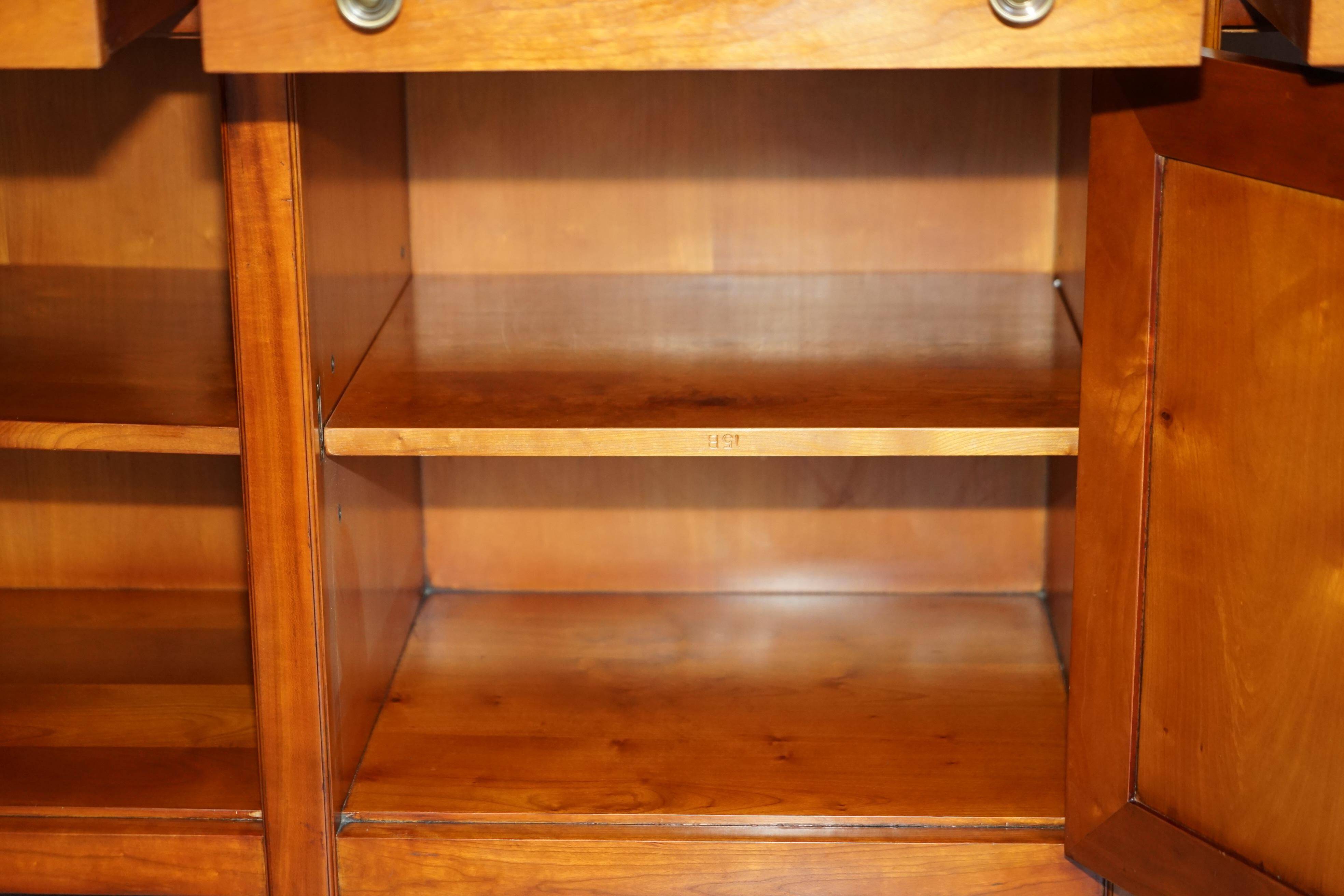 Large buffet Multiyork in solid cherry wood with six drawers.
