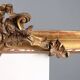 Golden wooden cornice with rocaille carving