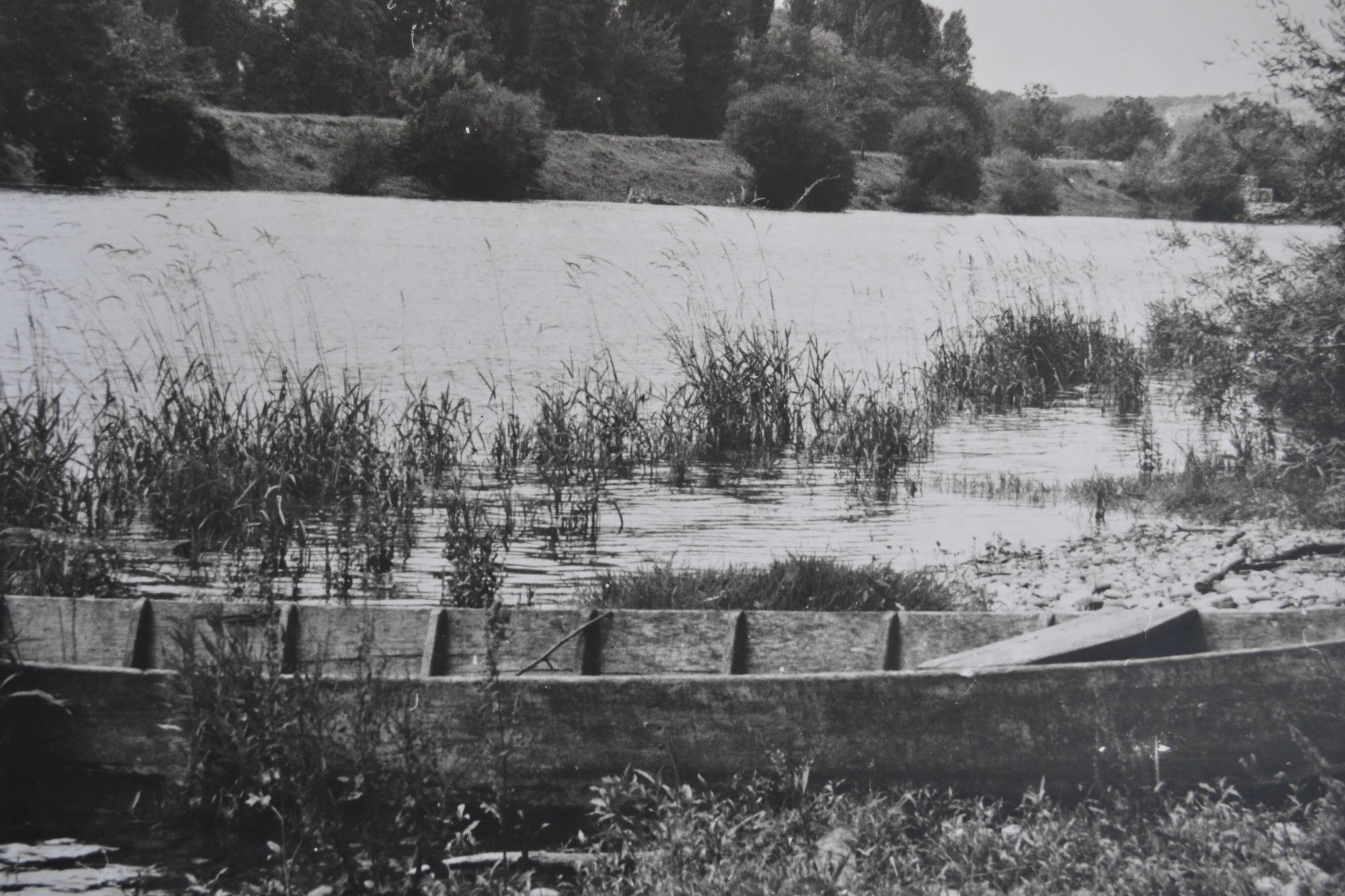 Anonymous film photo river and canoe circa 1970