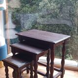Nesting tables in oak wood. Turned wooden legs.