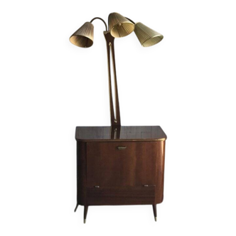 Art Deco drinks cabinet in brown walnut with integrated lamp and brass, 1950s.