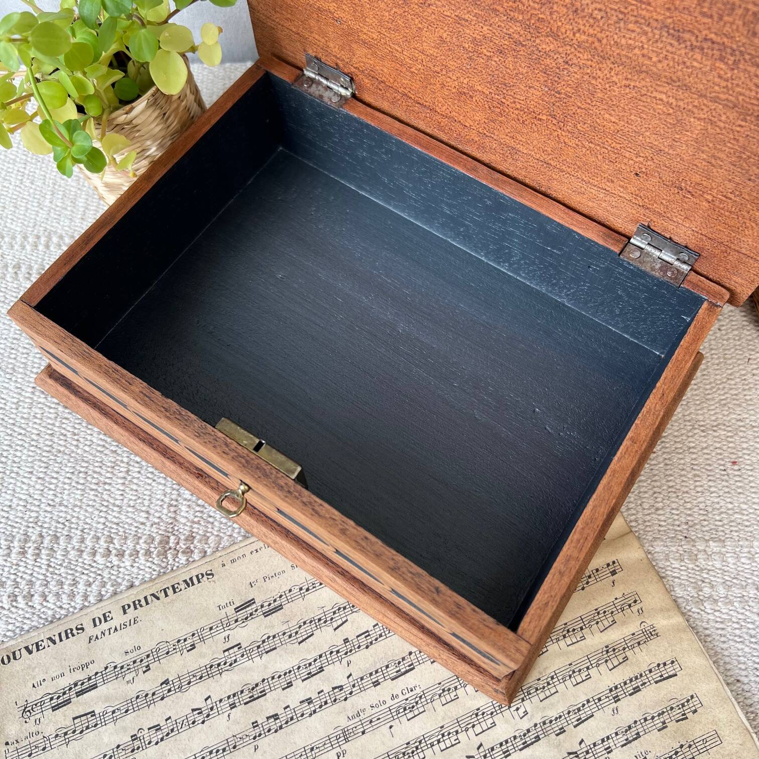 Carved wooden box with key