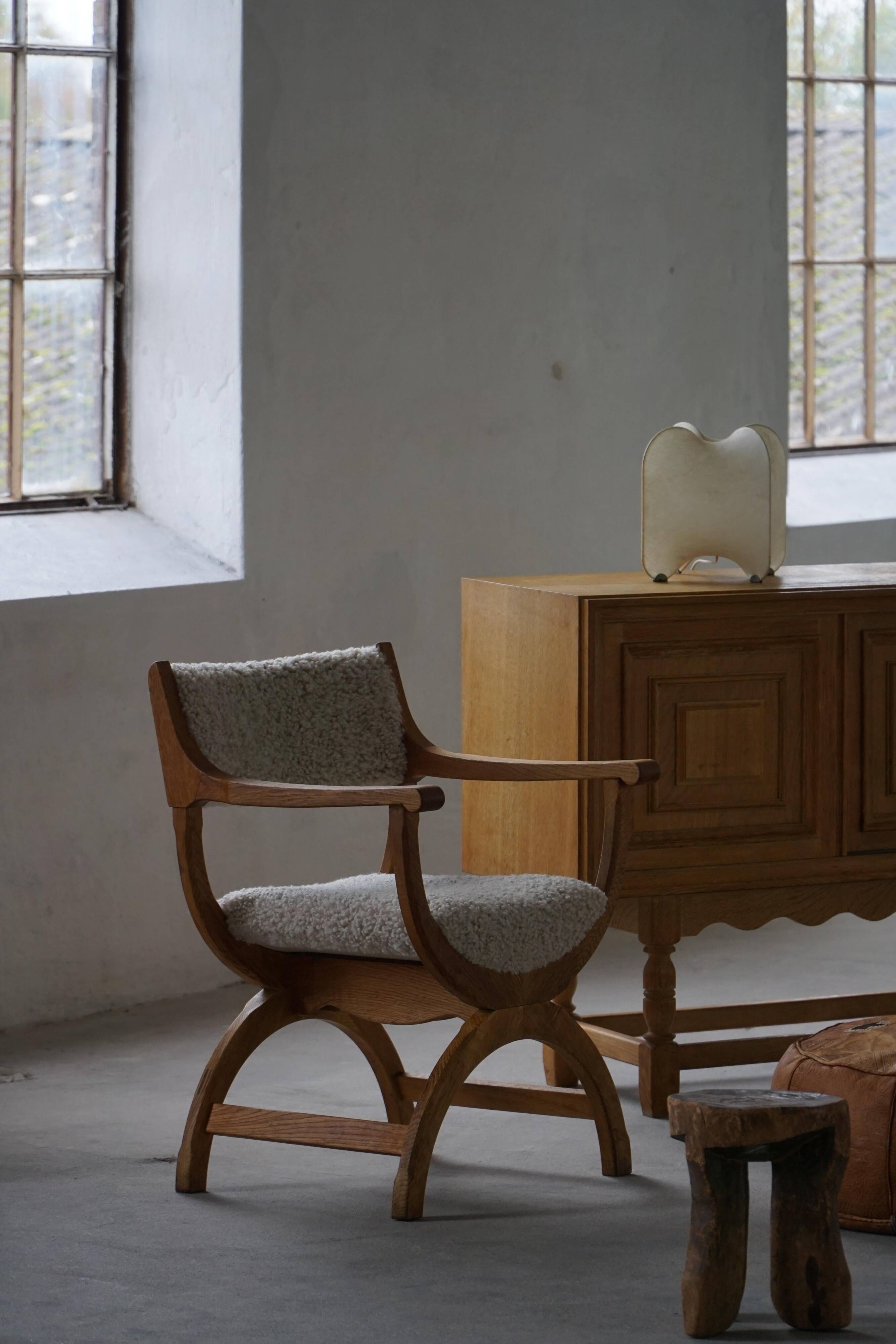 Henning Kjærnulf, Oak and lambswool armchair, "Kurul" model, Mid-century, 1960s