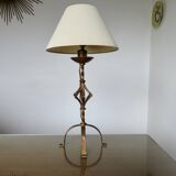 Large "Arts & Crafts" style lamp in beaten iron with a golden patina.