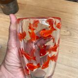 Glass vase with fish inclusions