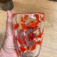 Vase en verre avec inclusions poissons