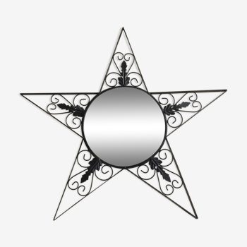 Star-shaped wrought iron round mirror