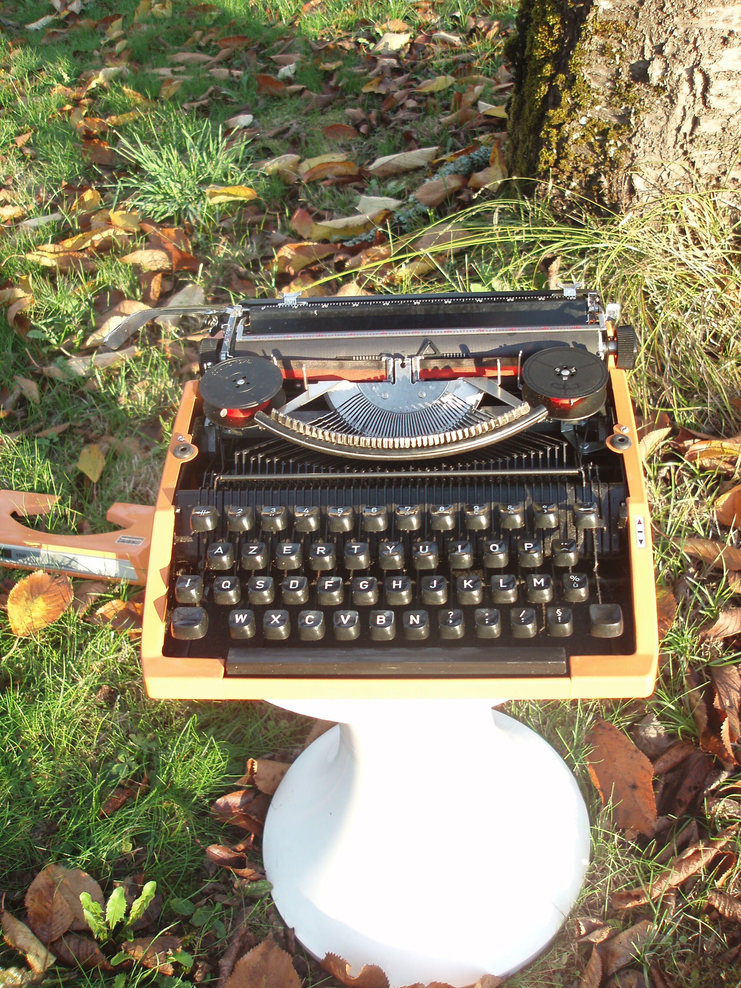 Silver reed orange and black typewriter with bag