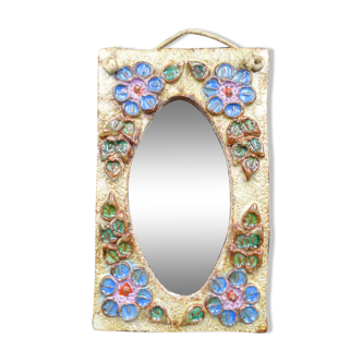 Flower-decorated sandstone mirror, circa 1970