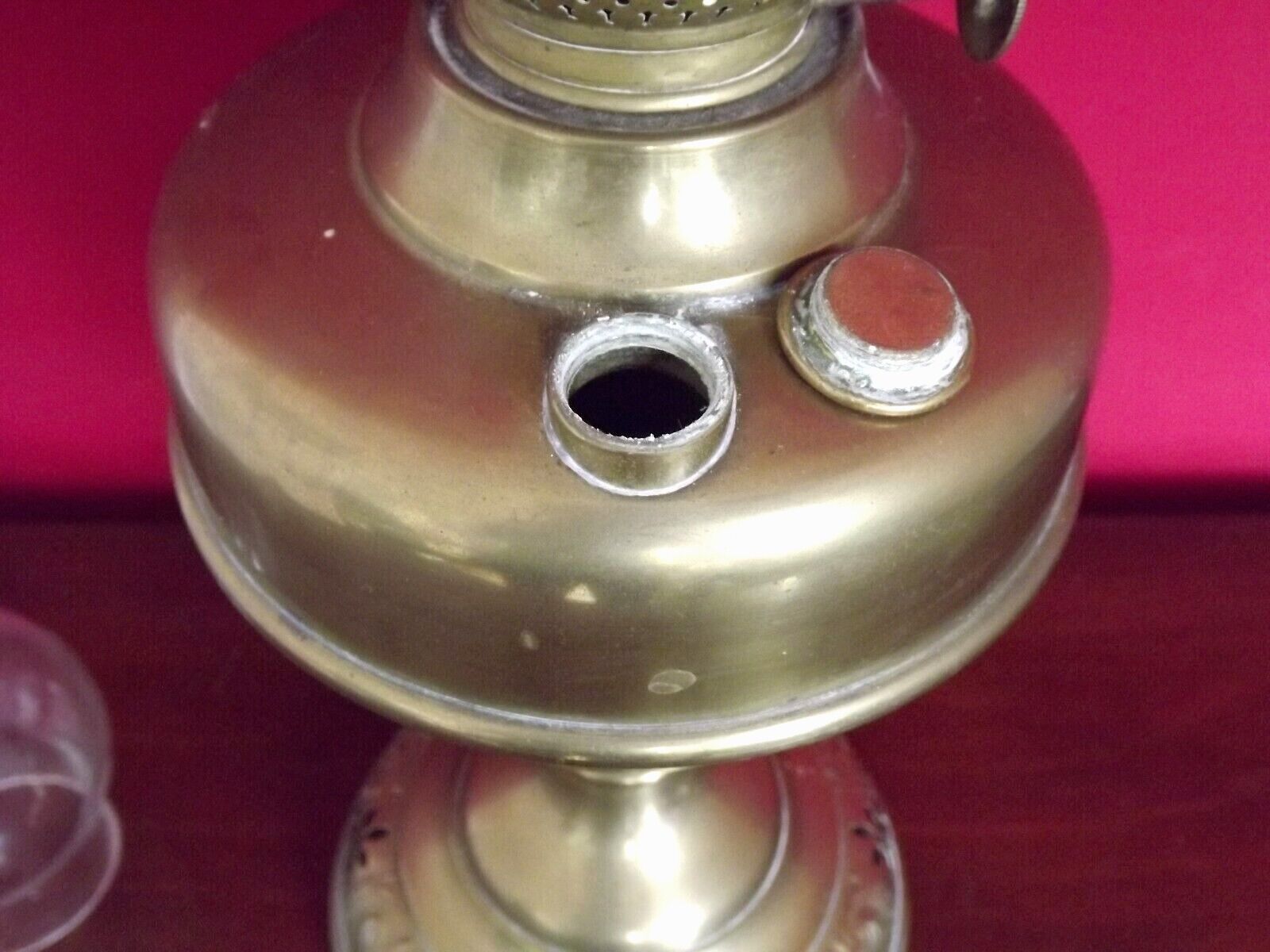Vintage brass oil lantern with decorative base and transparent glass funnel stamped L B Brand Delay 4399.