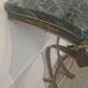 Bronze console