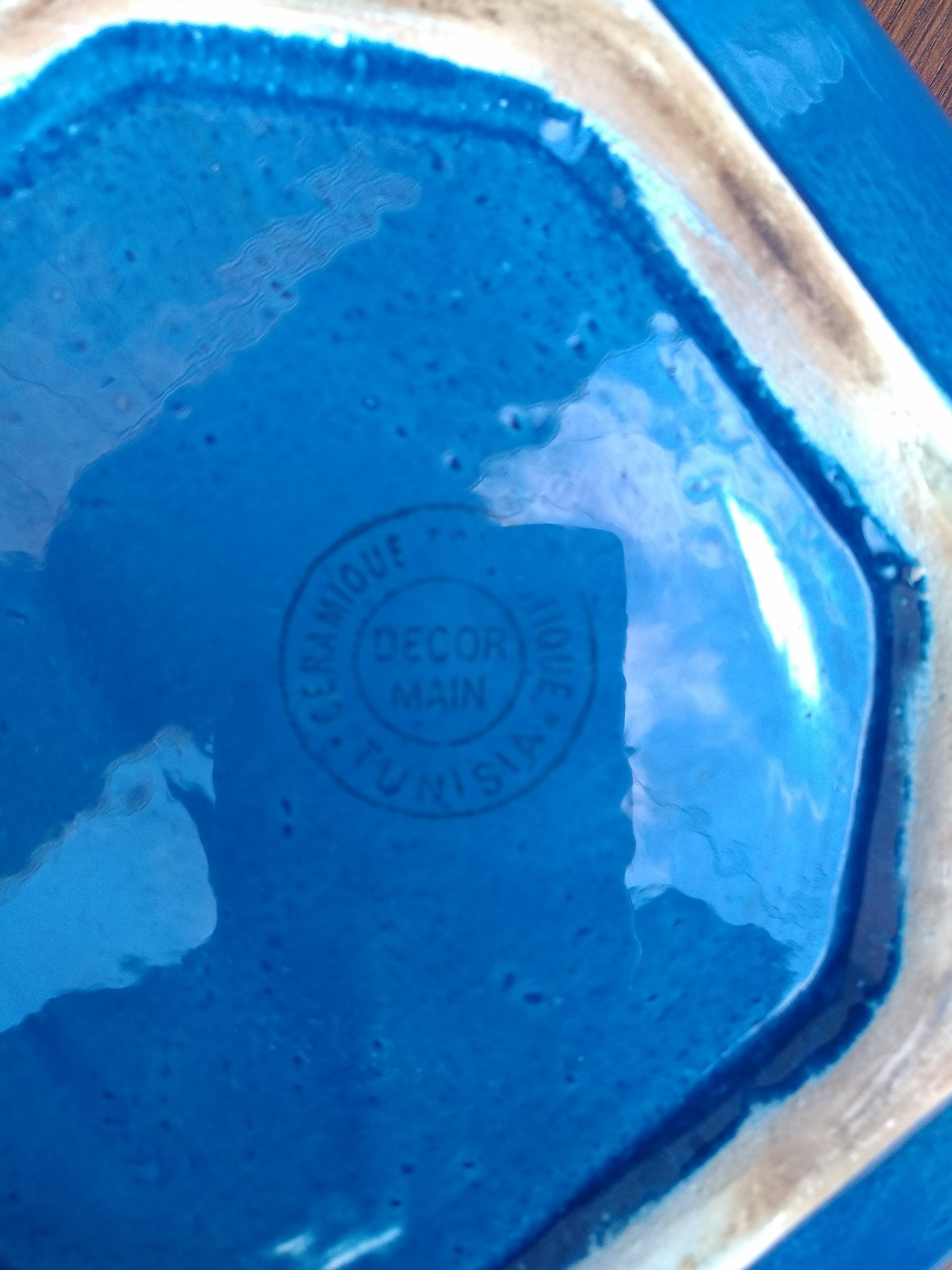 Blue ethnic dish or salad bowl