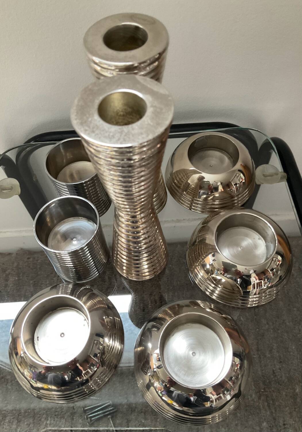 Series of 8 vintage candlesticks in silver metal