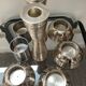 Series of 8 vintage candlesticks in silver metal
