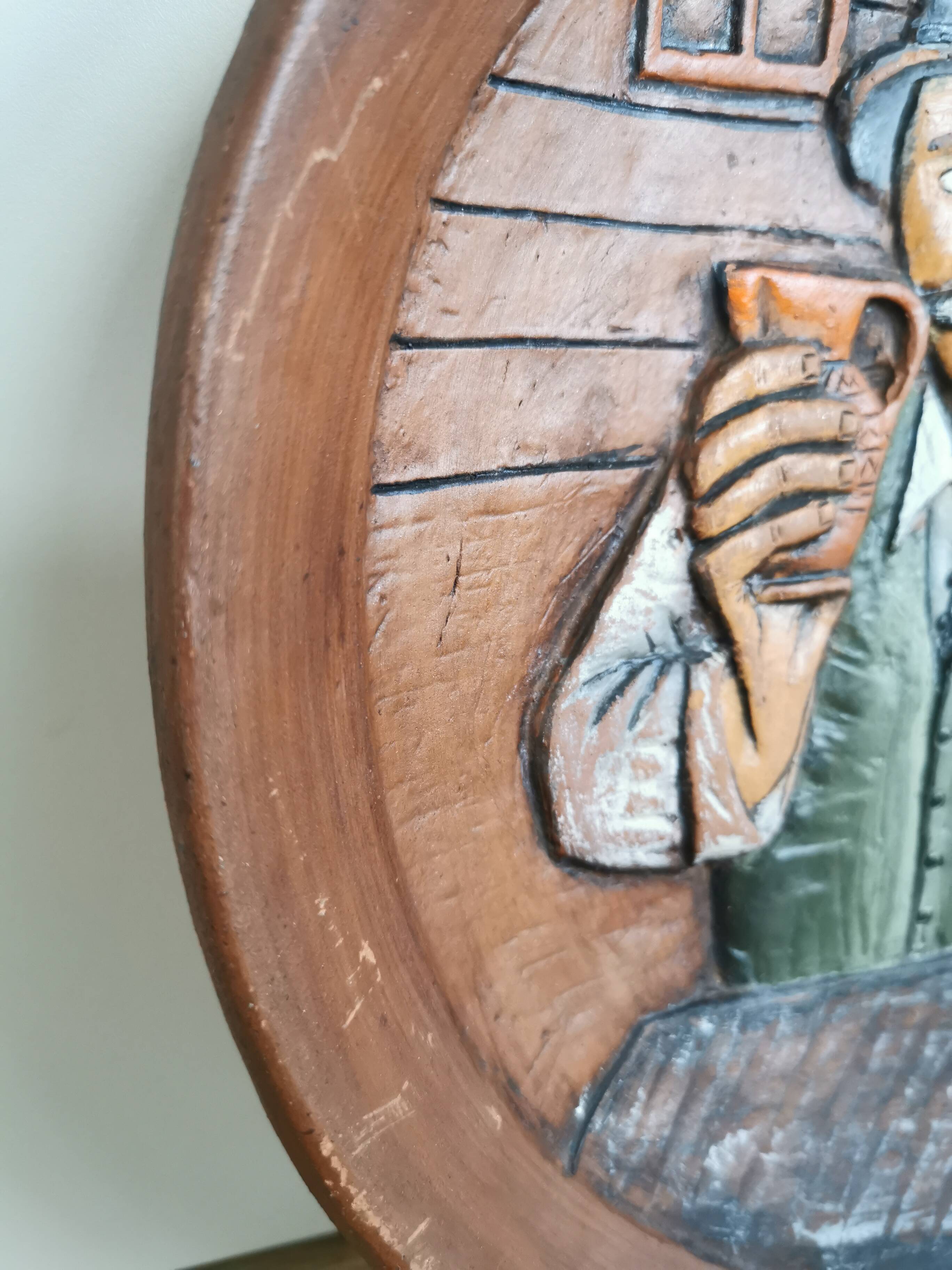 Vintage Embossed Clay Plate: Man Drinking, Retro Wall Decor