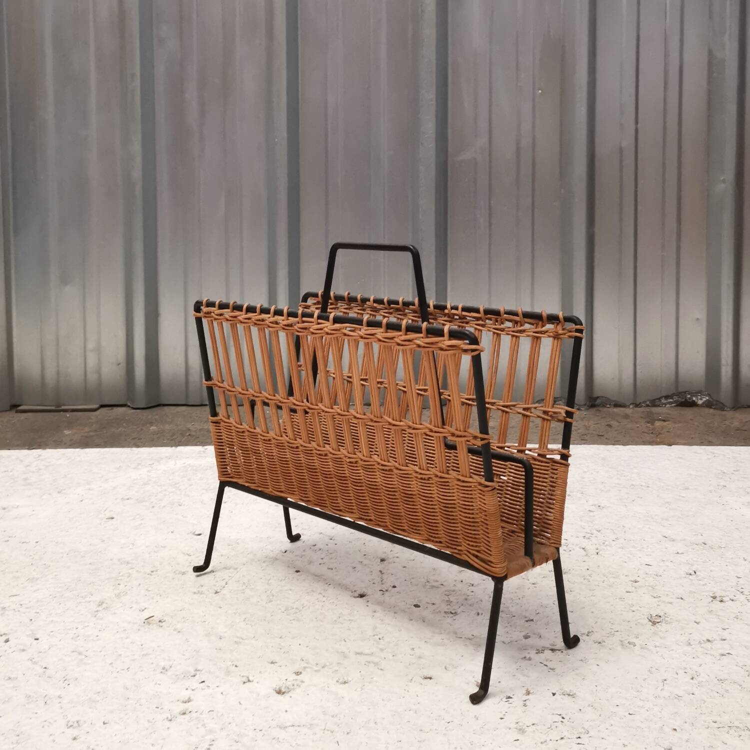 Vintage rattan and metal magazine rack, Raoul Guys
