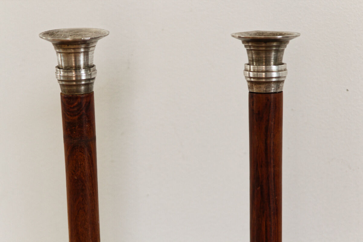 Pair of Indian candle holders, wood and silver metal