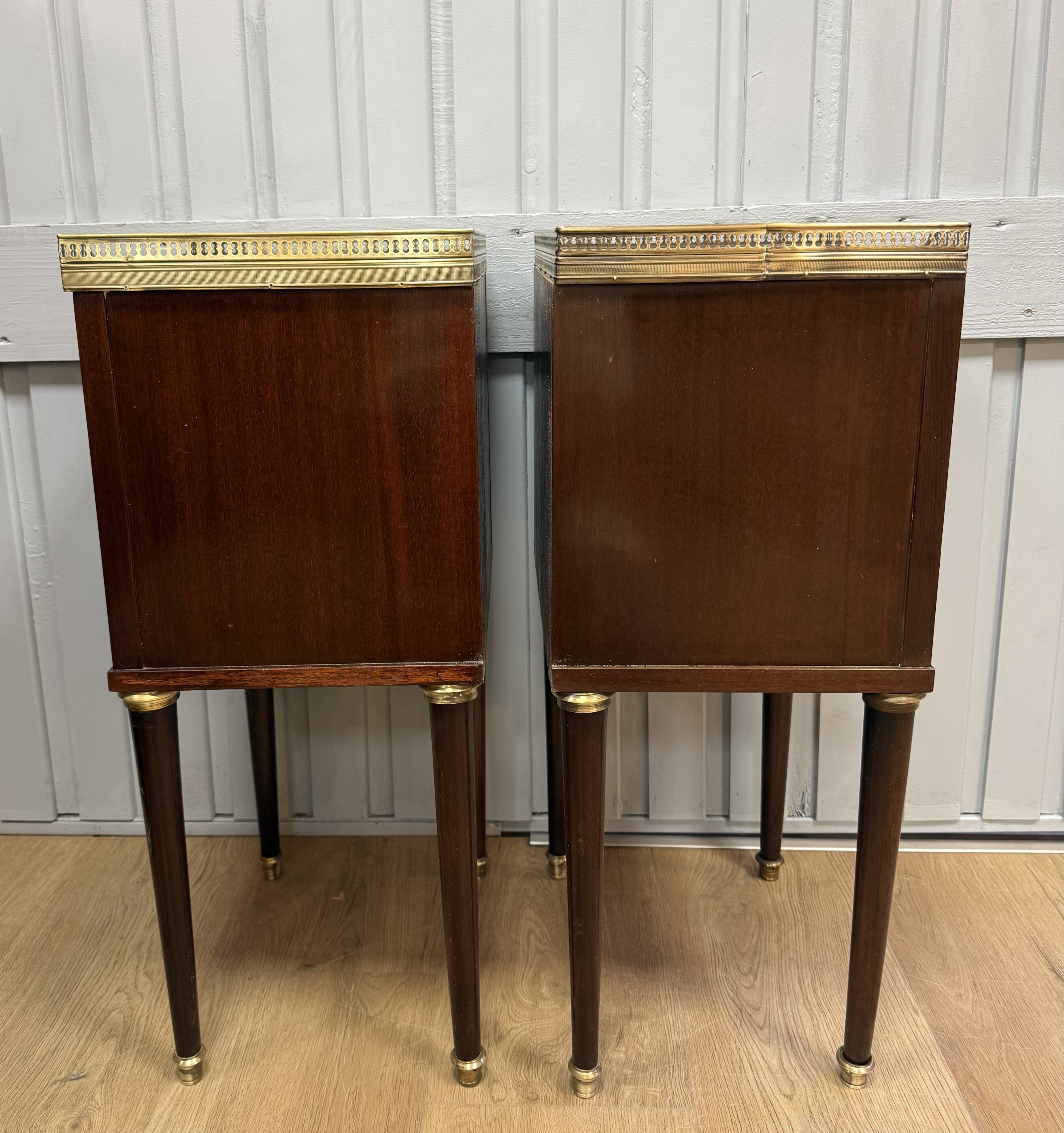 Pair of Louis XVI style bedside tables in mahogany