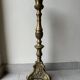 Gilded bronze candlestick with cherub trio decoration