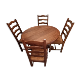 Carved central foot table and chairs