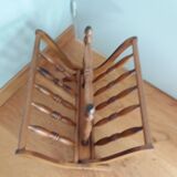 Turned wooden magazine holder