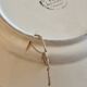Decorative plate in glazed earthenware HB Quimper with ethnic patterns.