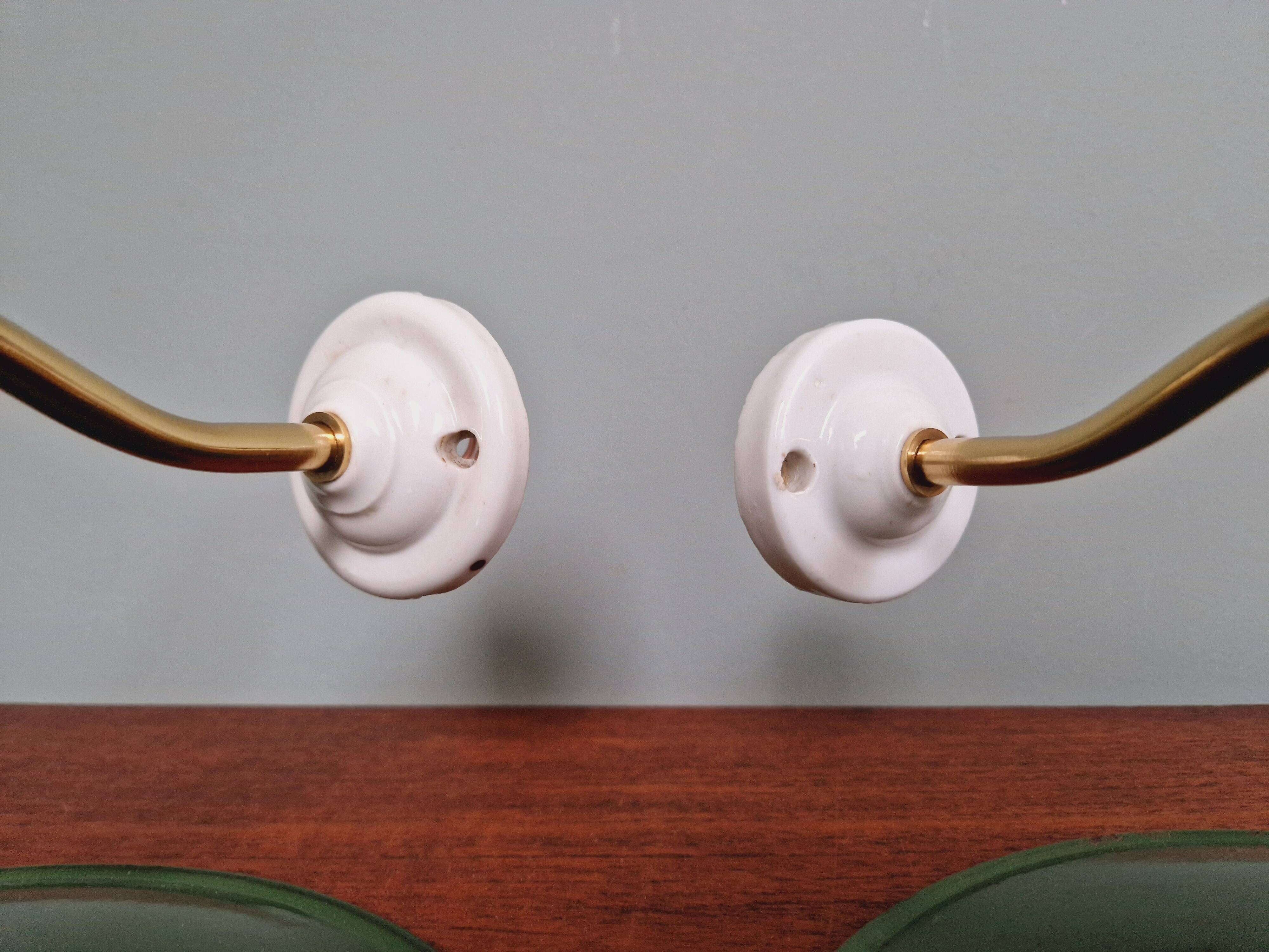 Pair of industrial wall lights in brass and green enameled sheet metal