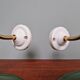Pair of industrial wall lights in brass and green enameled sheet metal