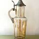 Vintage glass and tin jug