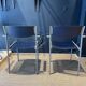 Pair of Gijs Van Der Sluis chairs with armrests in blue with grey steel legs