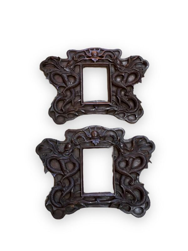 Paire de cadres en bois exotique aux dragons