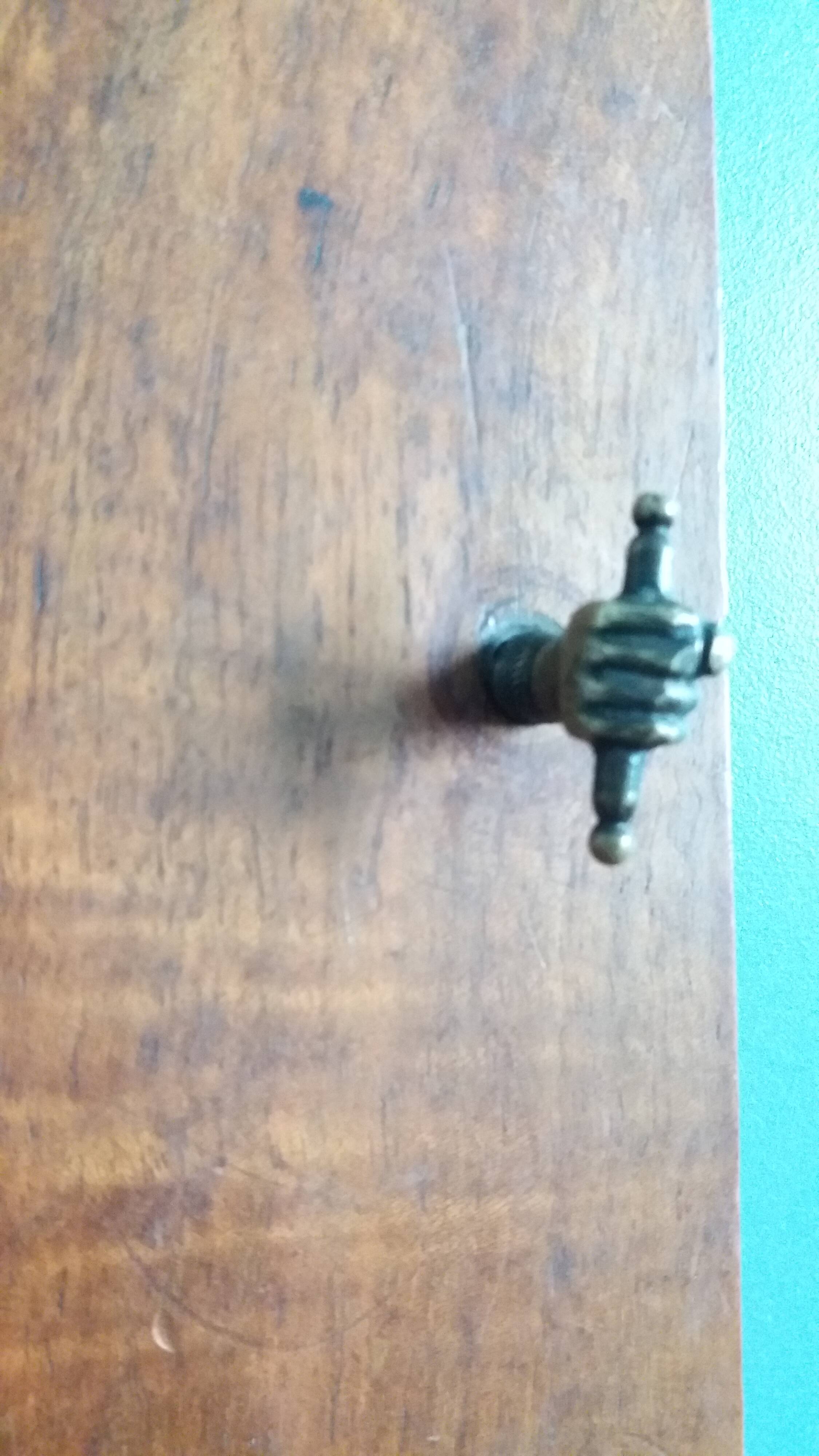 Old door with a bronze handle