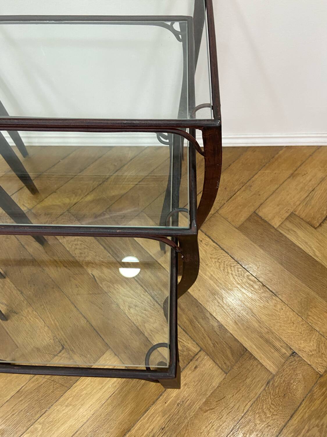 Nesting tables in wrought iron and glass